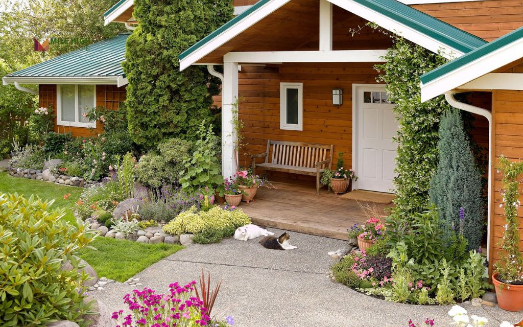 Semi-Circular Bed by Porch Entry with Mixed Heights