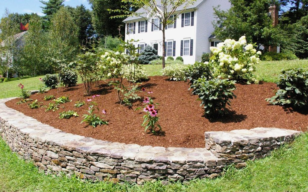 Sloped Corner Berm with Prairie Plants