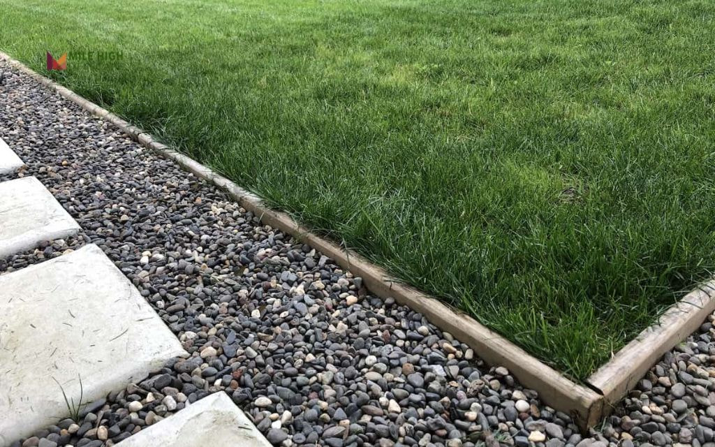 Decorative Rock Borders Along Walkways and Driveways