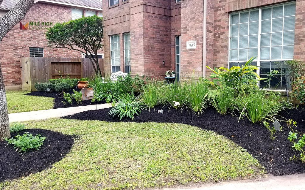Pots Embedded in Mulch Bed for Seasonal Color Swap