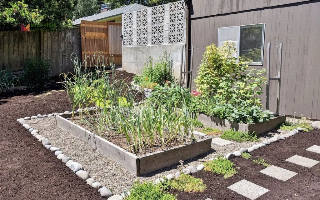 Raised Rock Beds with Dark Bark Mulch
