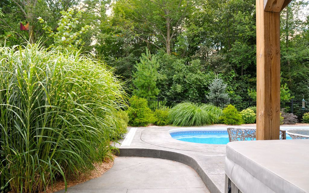 Tumbled Stone Perimeter with Ornamental Grasses