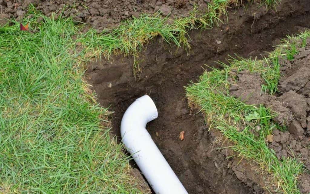 Ensure proper drainage and grading