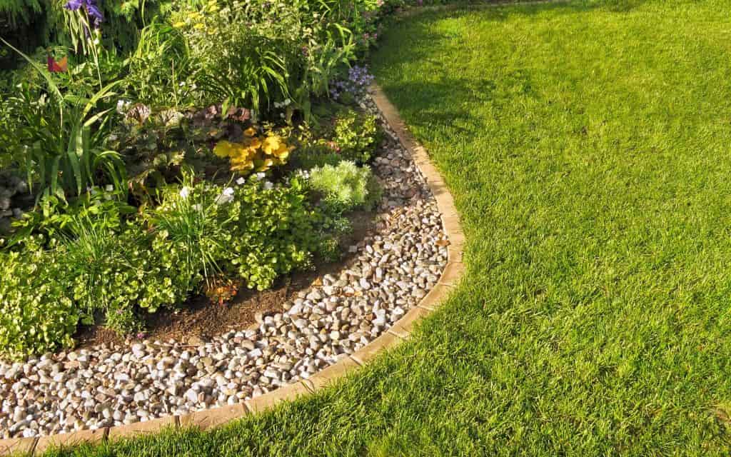 River rock flower bed borders