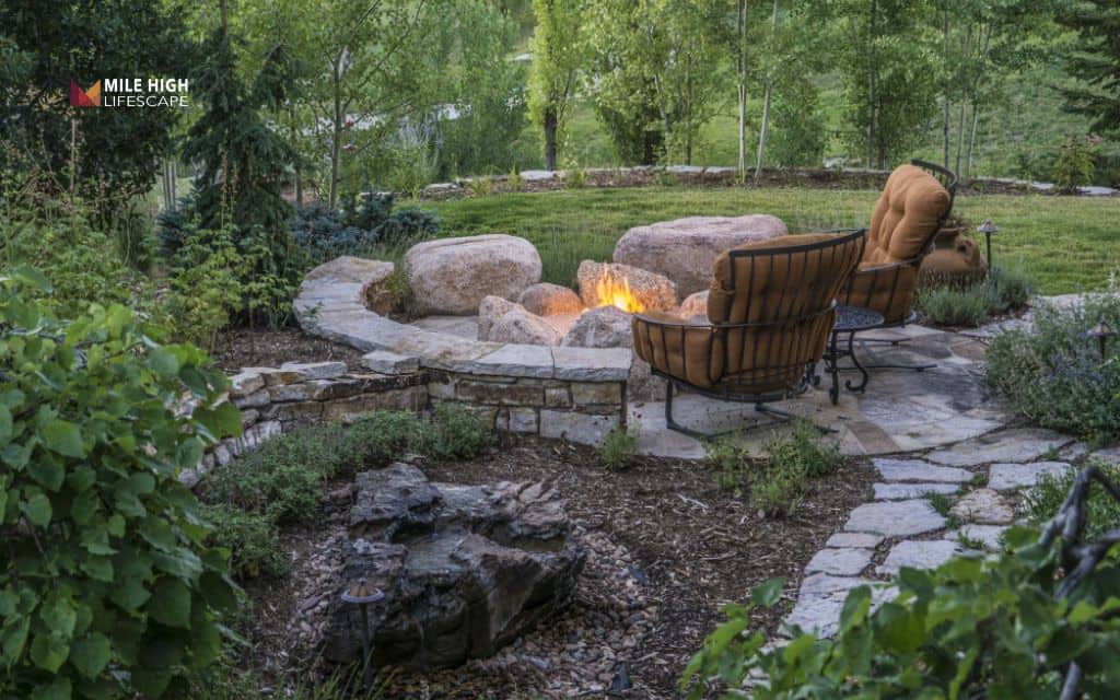 Boulder-framed fire pit area