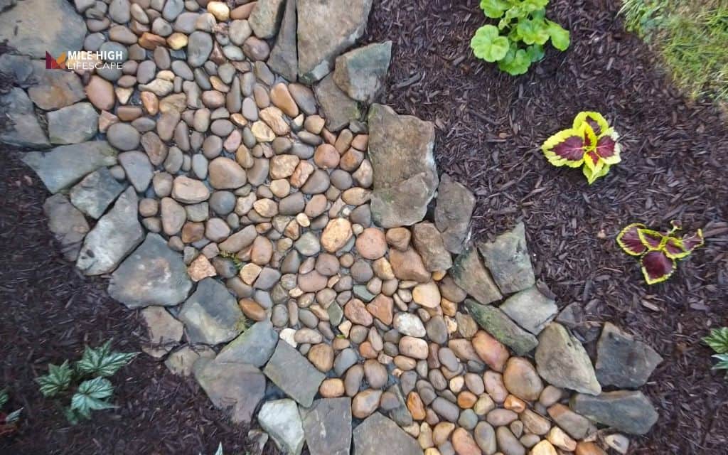 Dry creek bed rock garden for drainage