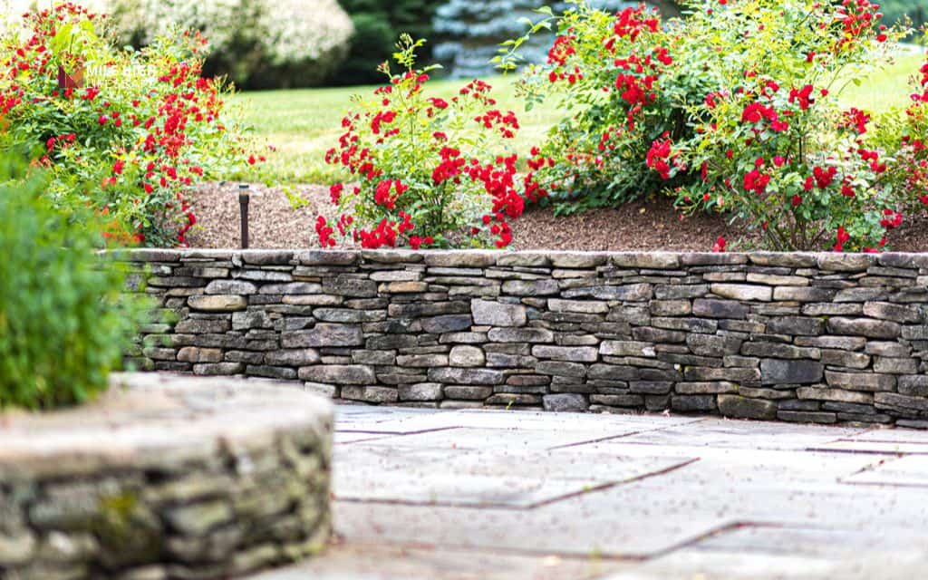 Dry-stack fieldstone garden wall