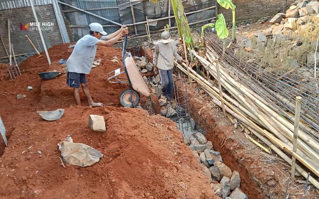 How to install a rock border around your house foundation