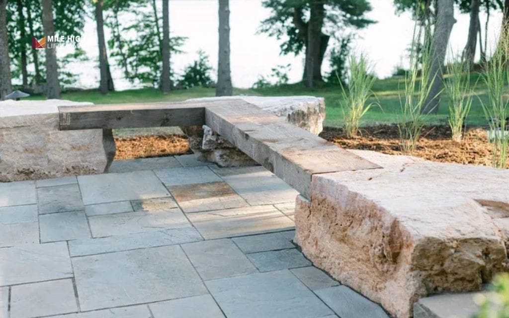Patio-edge rock garden with seating boulders