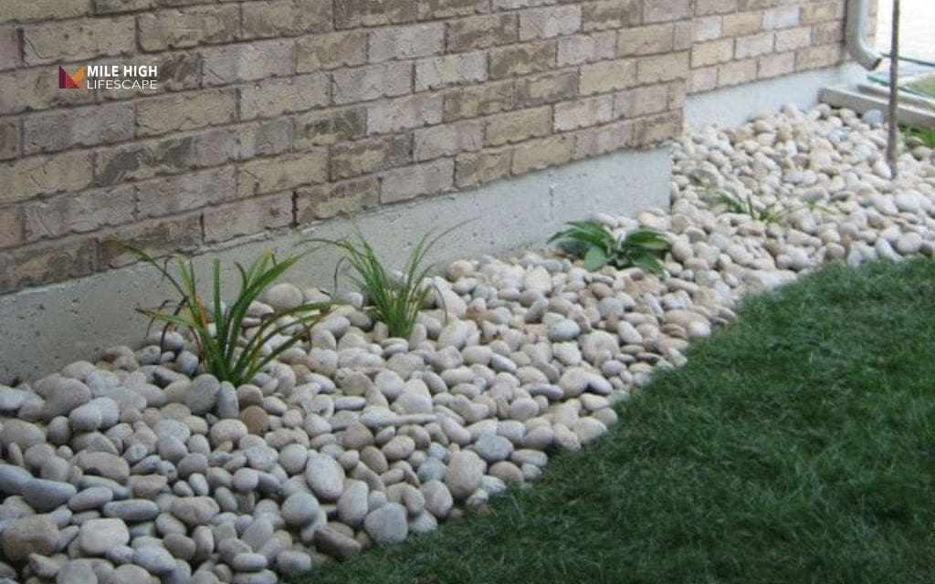 River rock accent garden around foundations