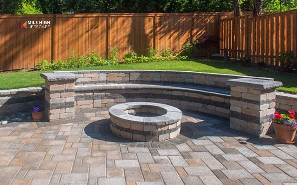 Rock wall fire pit enclosure