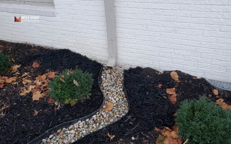 7 river rock drainage ideas that actually work in Denver's clay soil