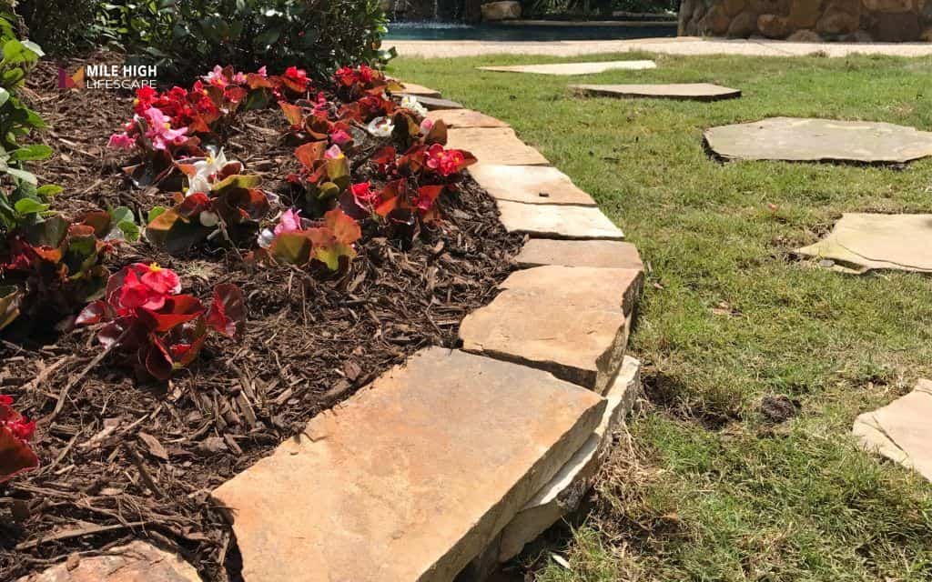 Flagstone border for garden beds