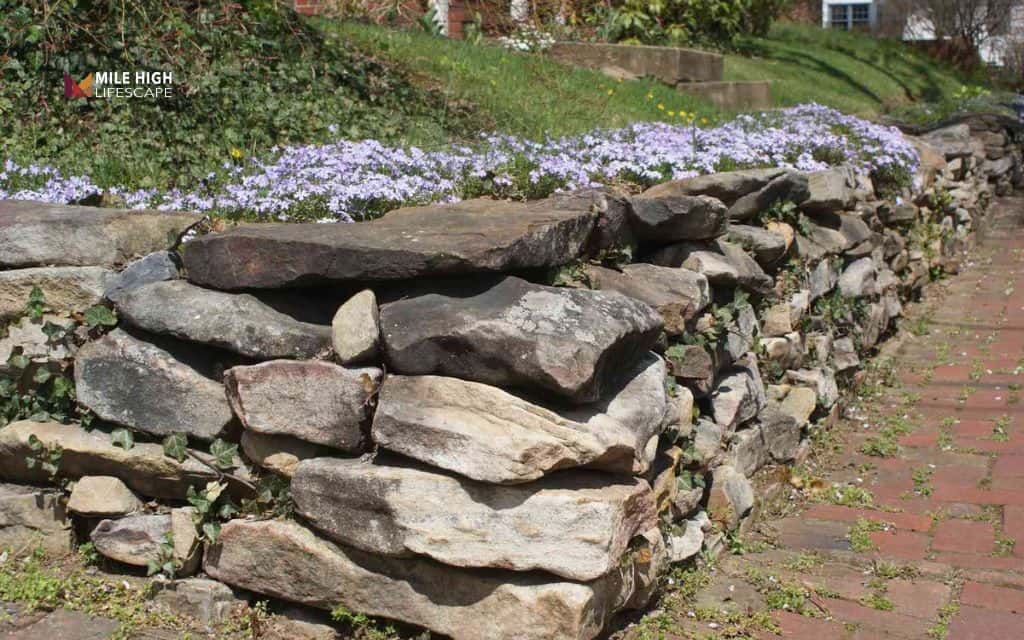 Flagstone retaining edge with gravel backfill