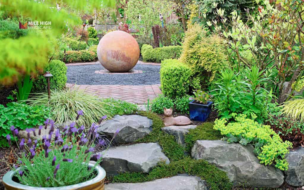 Front yard landscaping with rocks and groundcovers