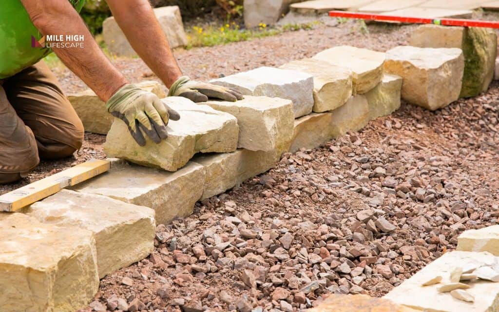 How to lay a rock wall on a slope or near a house
