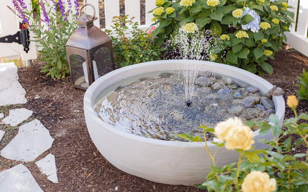 Patio rock fountain in a decorative bowl
