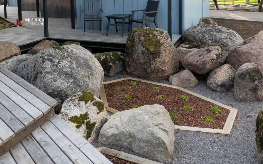 Rock landscaping with boulder accents