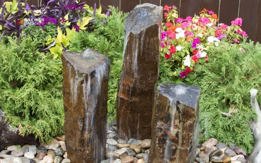 Stacked stone column fountain