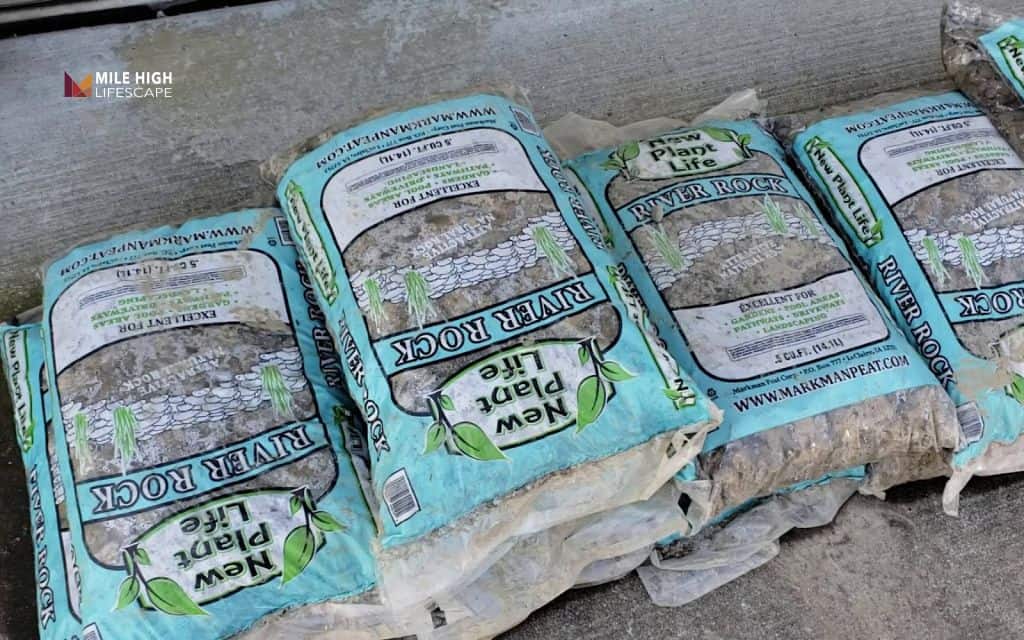 When river rock is a good drainage solution