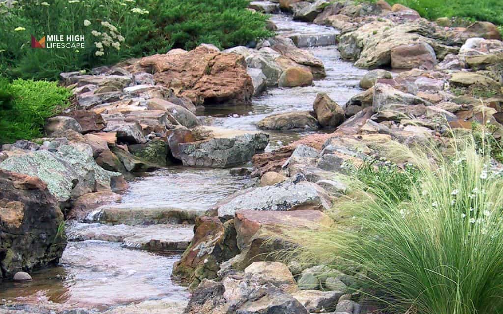 Boulders along drainage paths or dry creeks