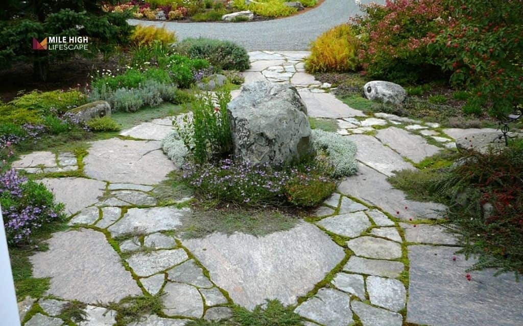landscaping with flat rocks: Classic flagstone walkway