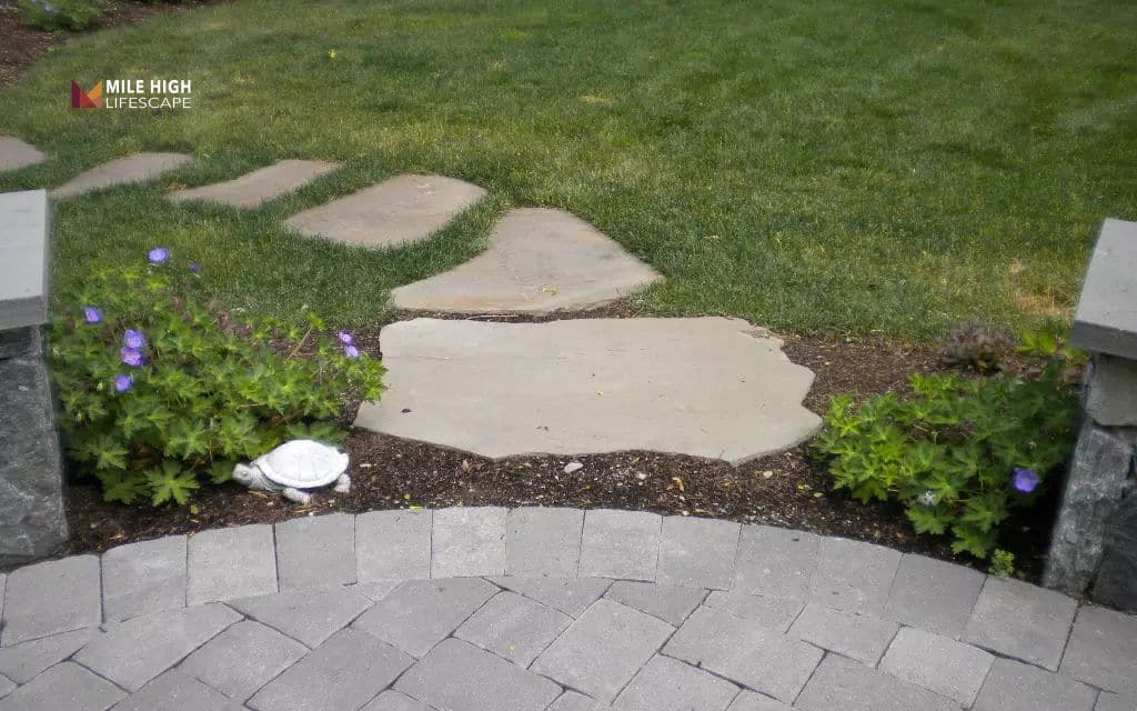 Flat rock patio-to-garden transition