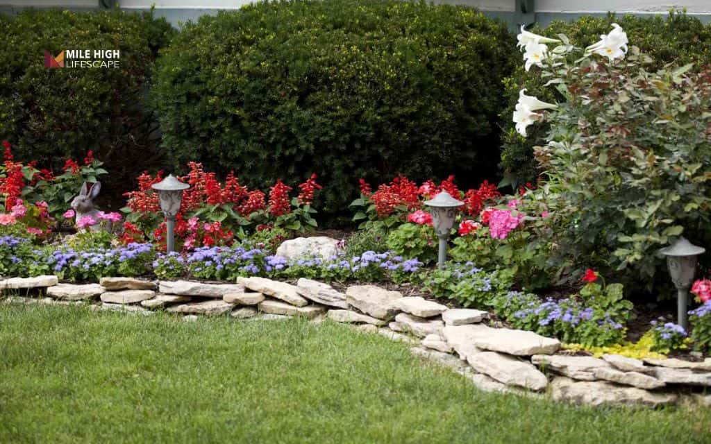 landscaping with flat rocks: Garden bed edging with flat rocks
