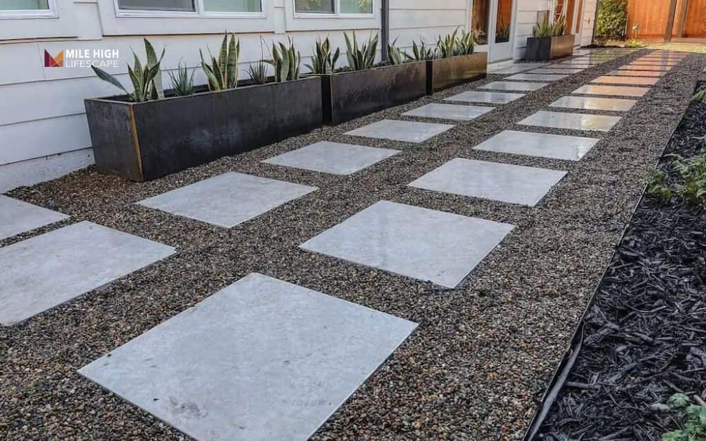 mid century modern landscape: Combine gravel with stepping stones