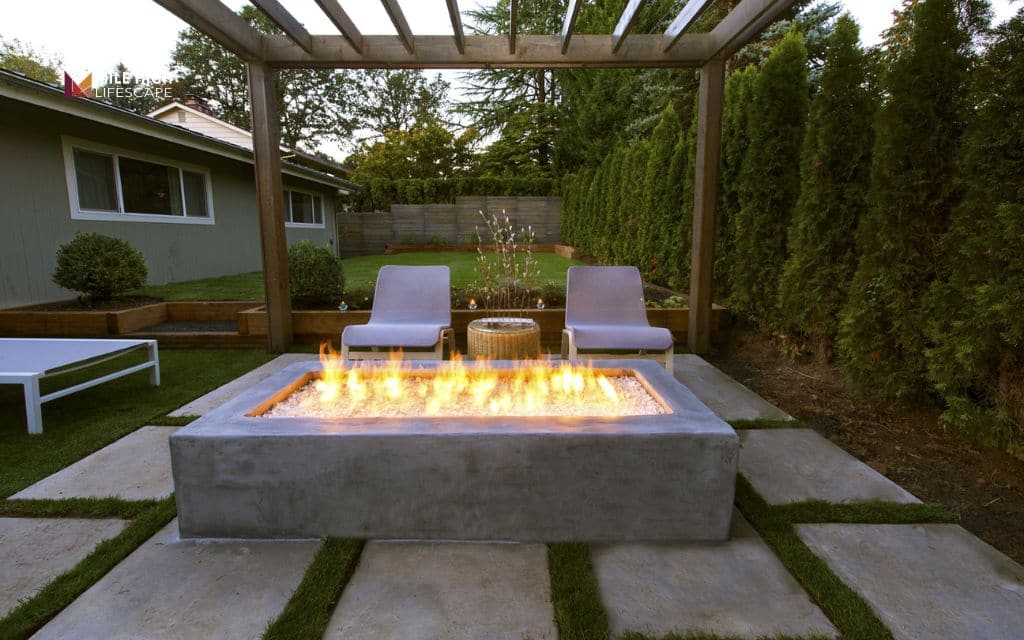 mid-century modern landscape: Incorporate a fire feature
