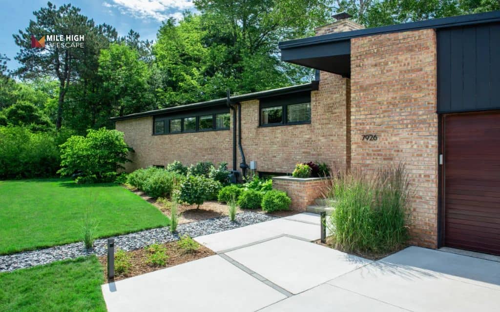 mid century modern landscape: Keep lawn areas minimal