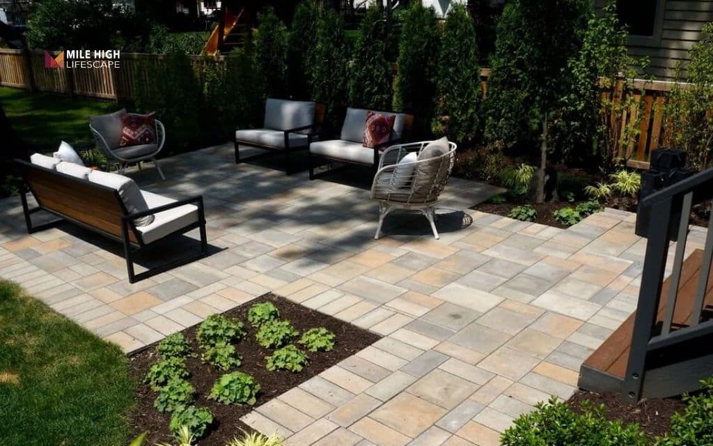 mid century modern landscape: Use geometric concrete pavers