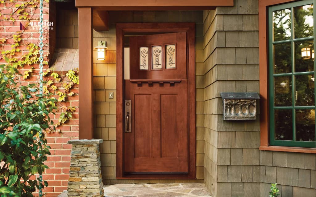 Front house fence ideas: Add a mailbox feature near the entrance gate