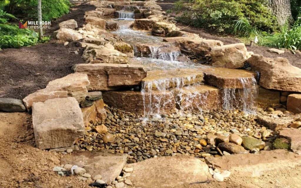Hillside landscaping ideas: Add a waterfall or stream feature
