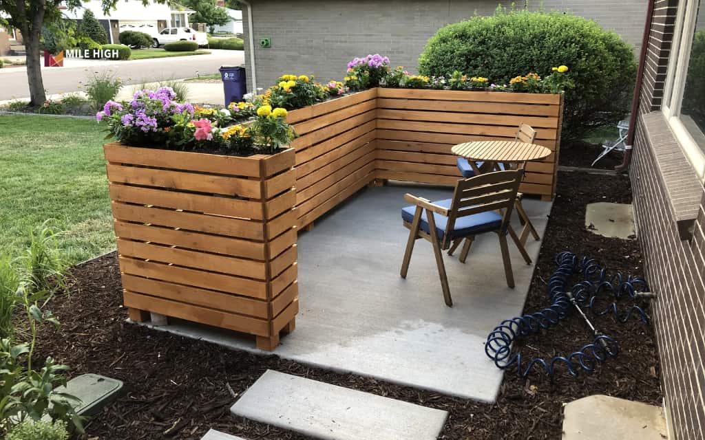 Front house fence ideas: Add built-in planters along the fence