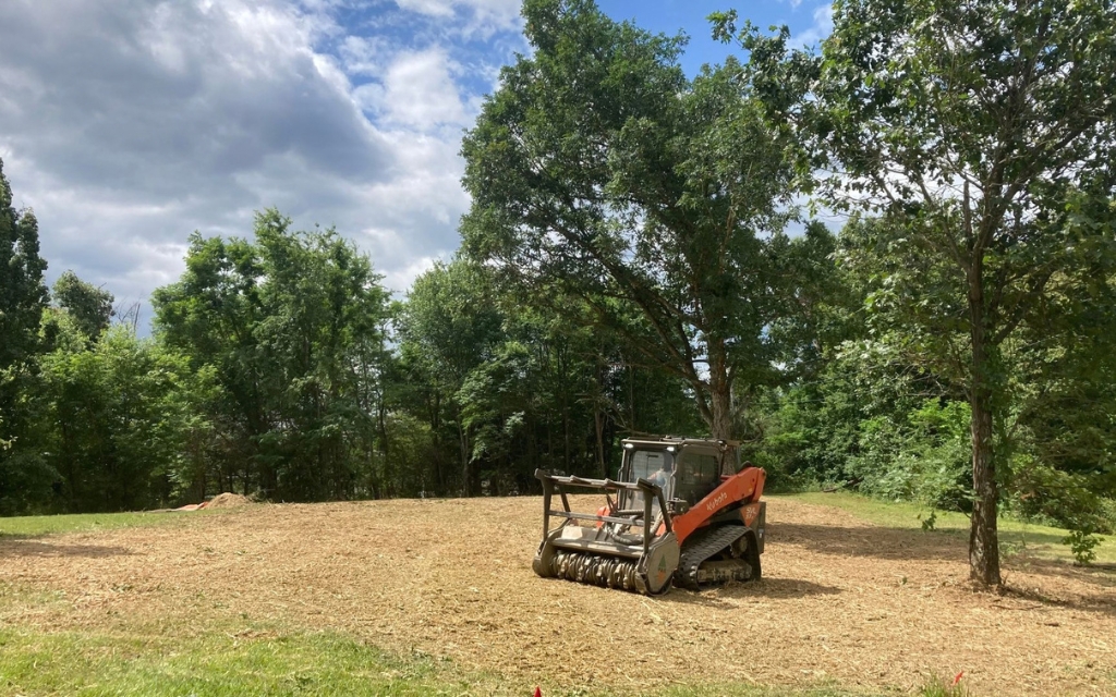 Standard pricing usually covers equipment, operator time, and vegetation processing